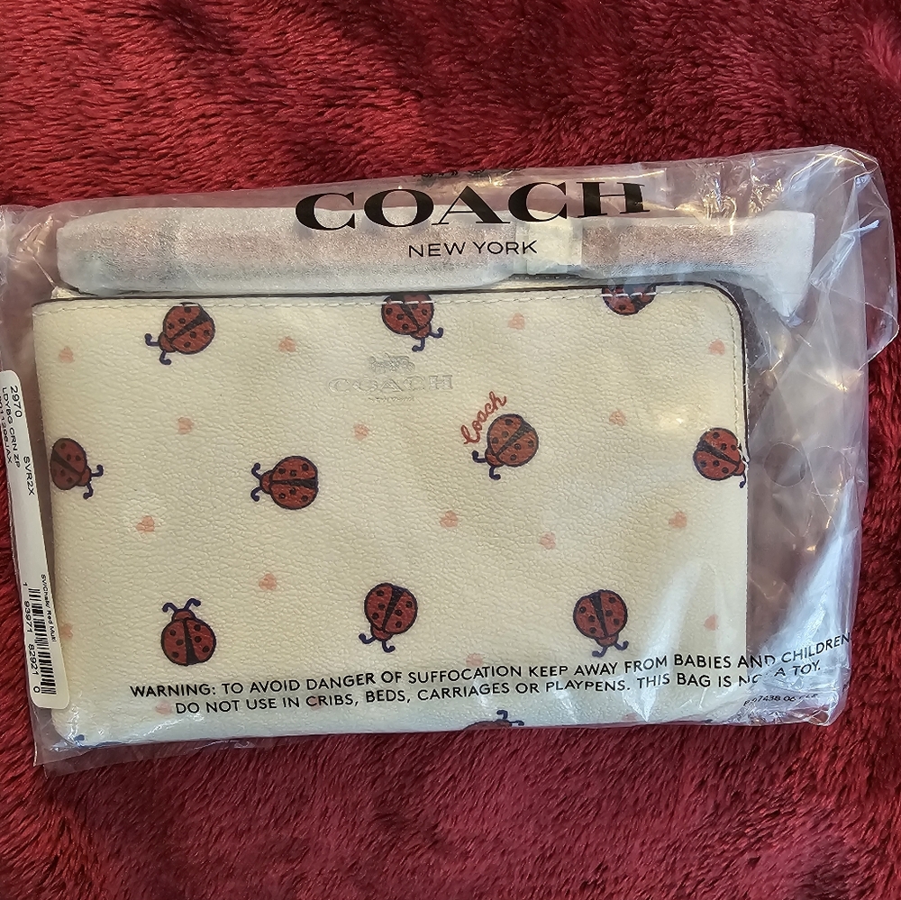 NWT COACH LADYBUG WRISTLET (DISCONTINUED PATTERN, RARE & HARD TO FIND)